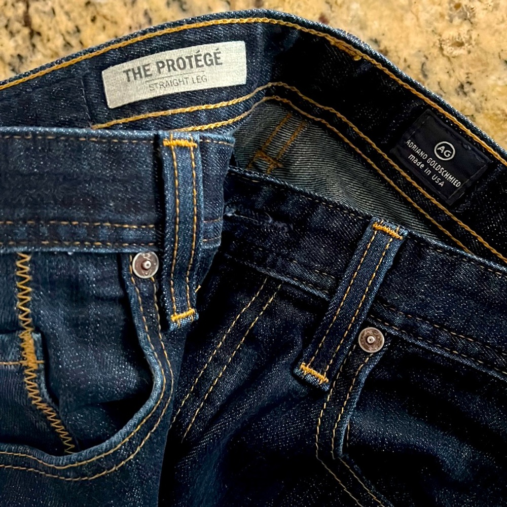 Lightly used AG Protege straight leg dark denim jeans.